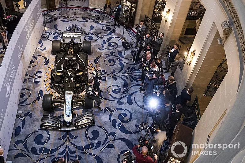 Romain Grosjean, Haas F1 Team and Kevin Magnussen, Haas F1 Team stand for photographs in front of the the new 2019 Haas livery on the Haas F1 Team VF-18 