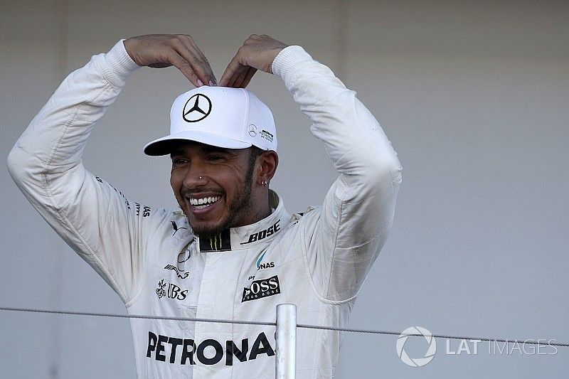 Race winner Lewis Hamilton, Mercedes AMG F1 celebrates on the podium