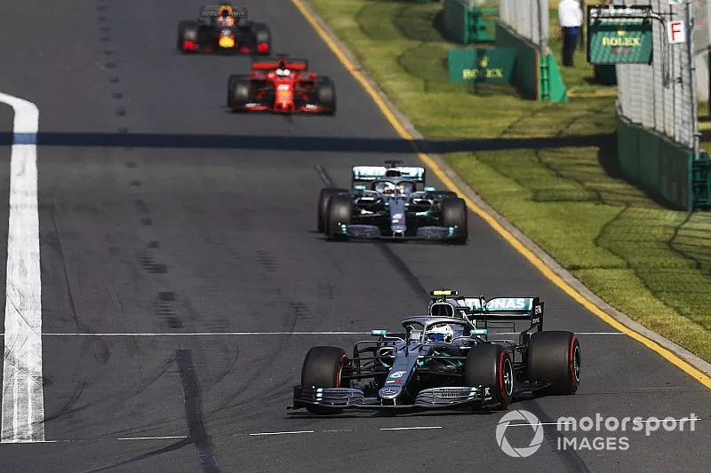 Valtteri Bottas, Mercedes AMG W10, leads Lewis Hamilton, Mercedes AMG F1 W10, and Sebastian Vettel, Ferrari SF90