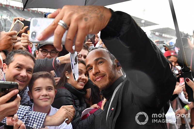 Lewis Hamilton, Mercedes AMG F1 takes a selfie with a fan 