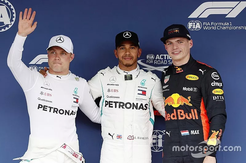Pole sitter Lewis Hamilton, Mercedes AMG F1, second place Valtteri Bottas, Mercedes AMG F1, third place Max Verstappen, Red Bull Racing

