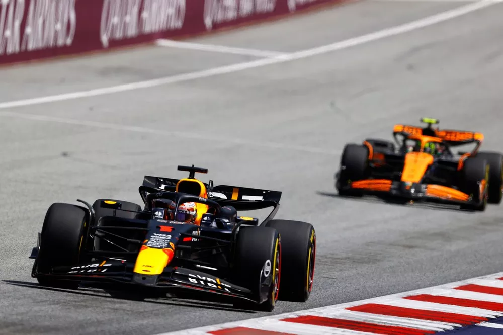 Max Verstappen, Red Bull Racing RB20, leads Lando Norris, McLaren MCL38