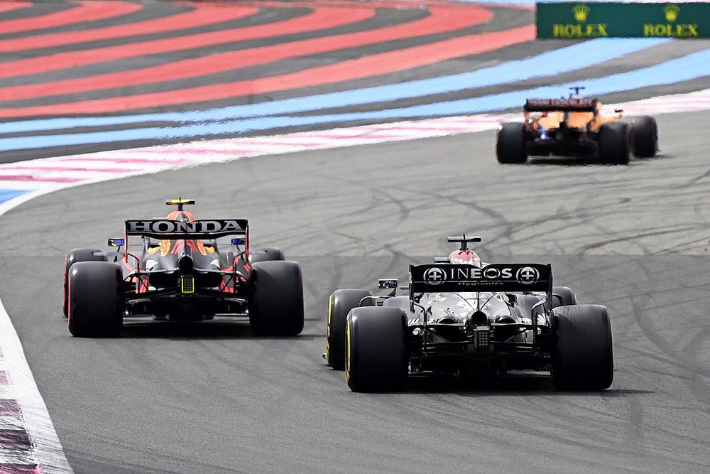 Daniel Ricciardo, McLaren MCL35M, Sergio Perez, Red Bull Racing RB16B, and Lewis Hamilton, Mercedes W12
