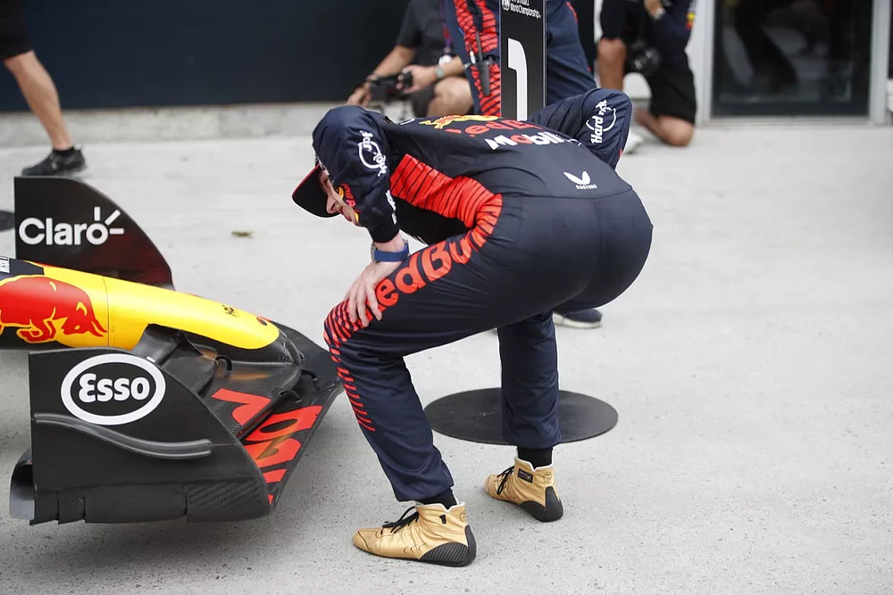 Max Verstappen, Red Bull Racing, 1st position, inspects his car in Parc Ferme