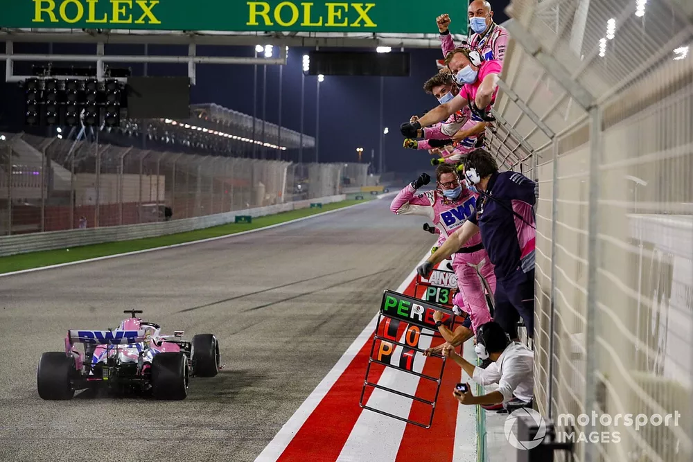 Race Winner Sergio Perez, Racing Point crosses the finish line to his team celebrating