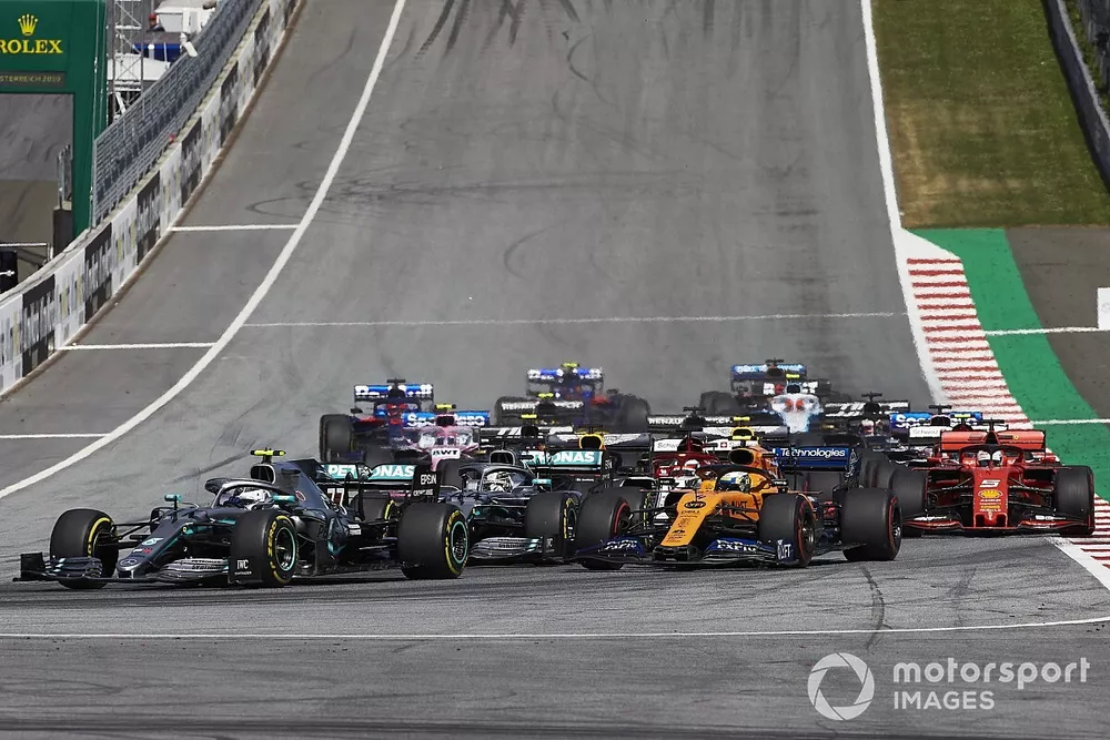 Valtteri Bottas, Mercedes AMG W10, leads Lewis Hamilton, Mercedes AMG F1 W10, Lando Norris, McLaren MCL34, Sebastian Vettel, Ferrari SF90, Lance Stroll, Racing Point RP19, and the remainder of the field at the start