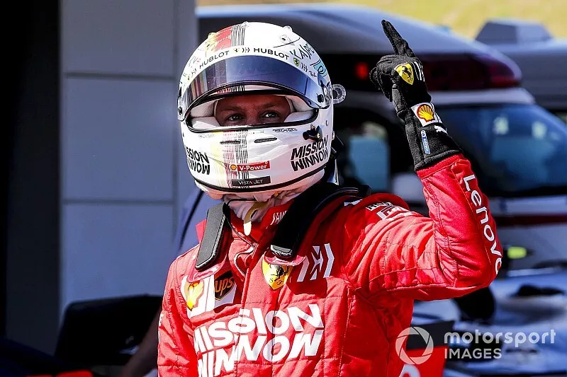 Le poleman Sebastian Vettel, Ferrari, dans le Parc Ferm&eacute;