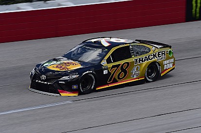 Truex wins Stage 1 at Darlington with last corner move on Larson