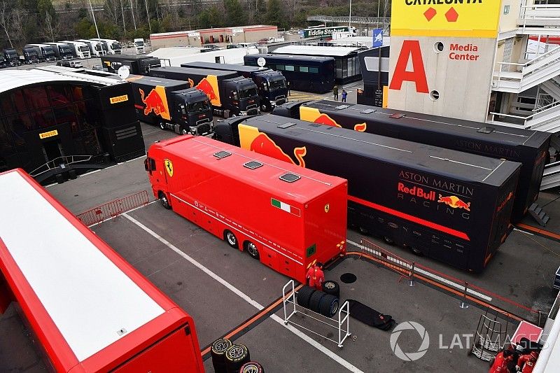 Ferrari and Red Bull Racing trucks in the Paddock