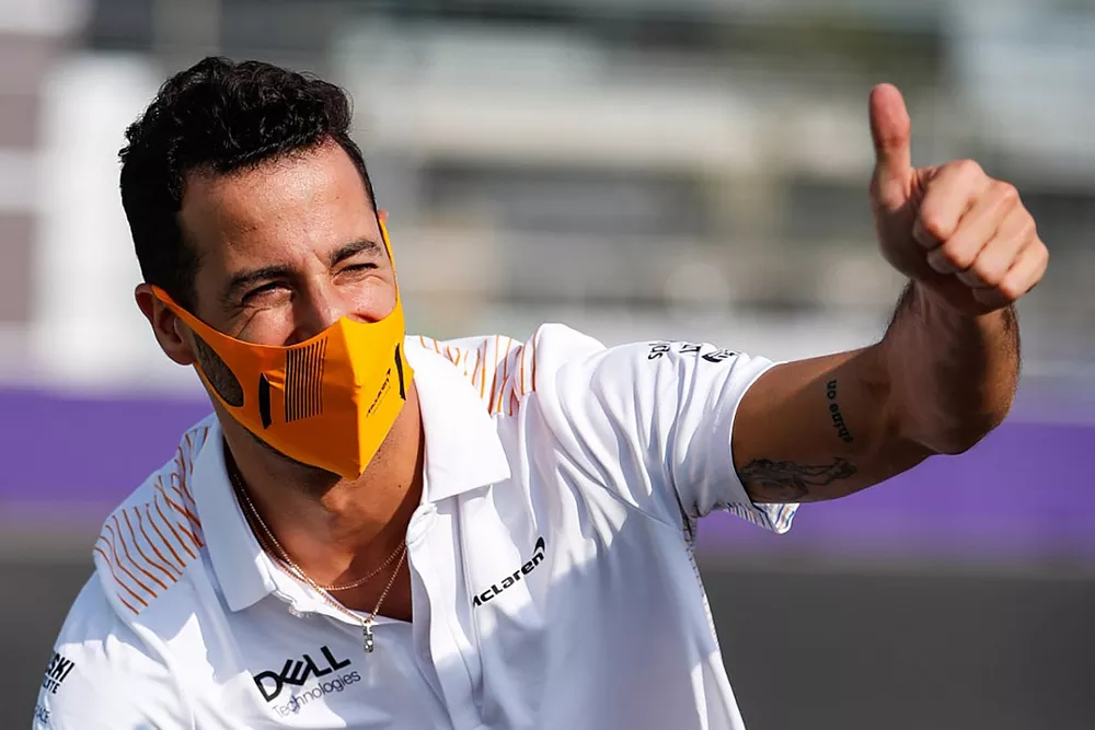 Daniel Ricciardo, McLaren, cycles the track
