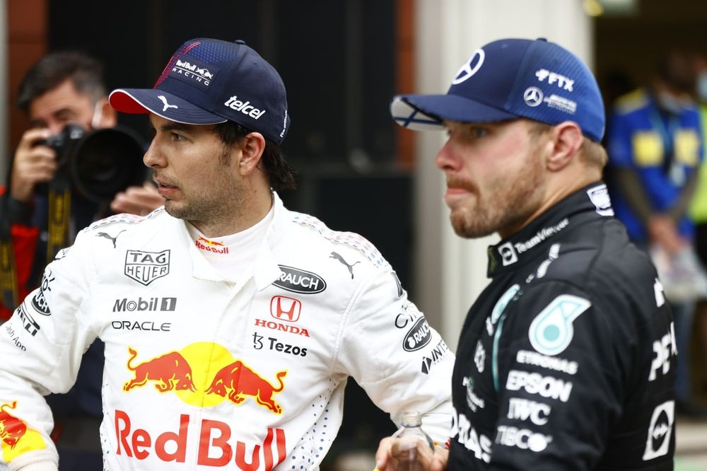 Sergio Perez, Red Bull Racing, 3rd position, and Valtteri Bottas, Mercedes, 1st position