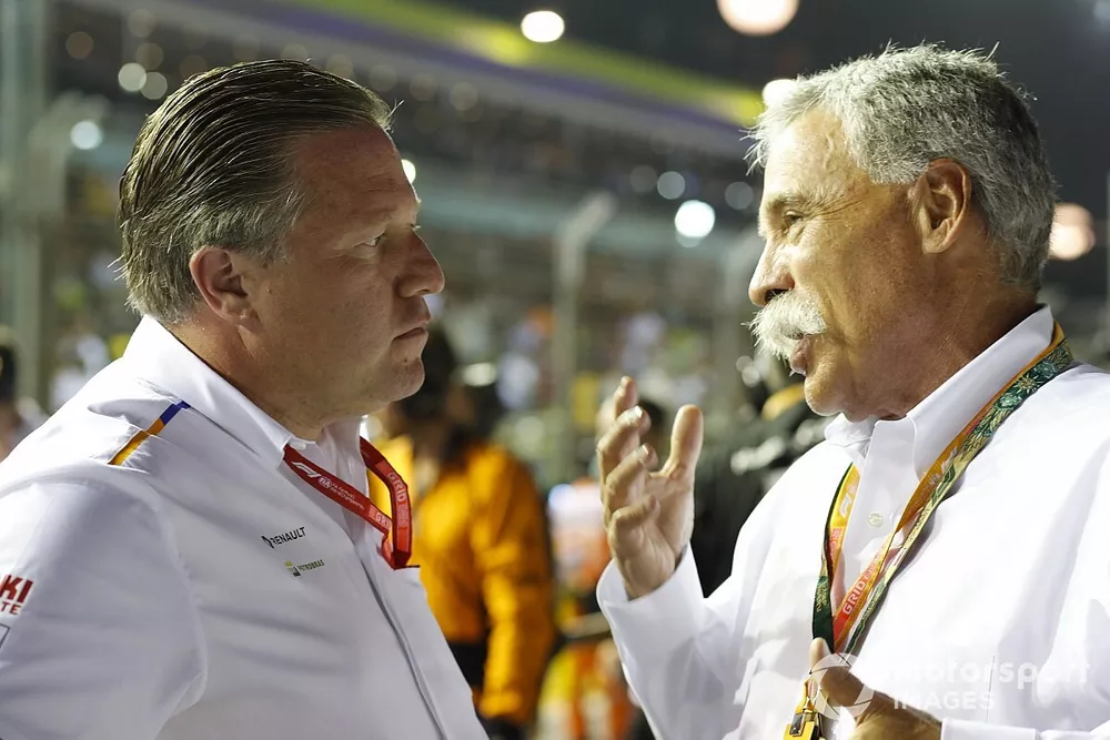 Zak Brown, Executive Director, McLaren, talks with Chase Carey, Chairman, Formula 1
