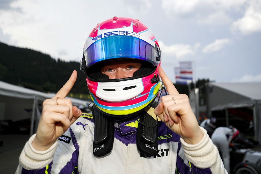 Alice Powell celebrates pole postion in Parc Ferme