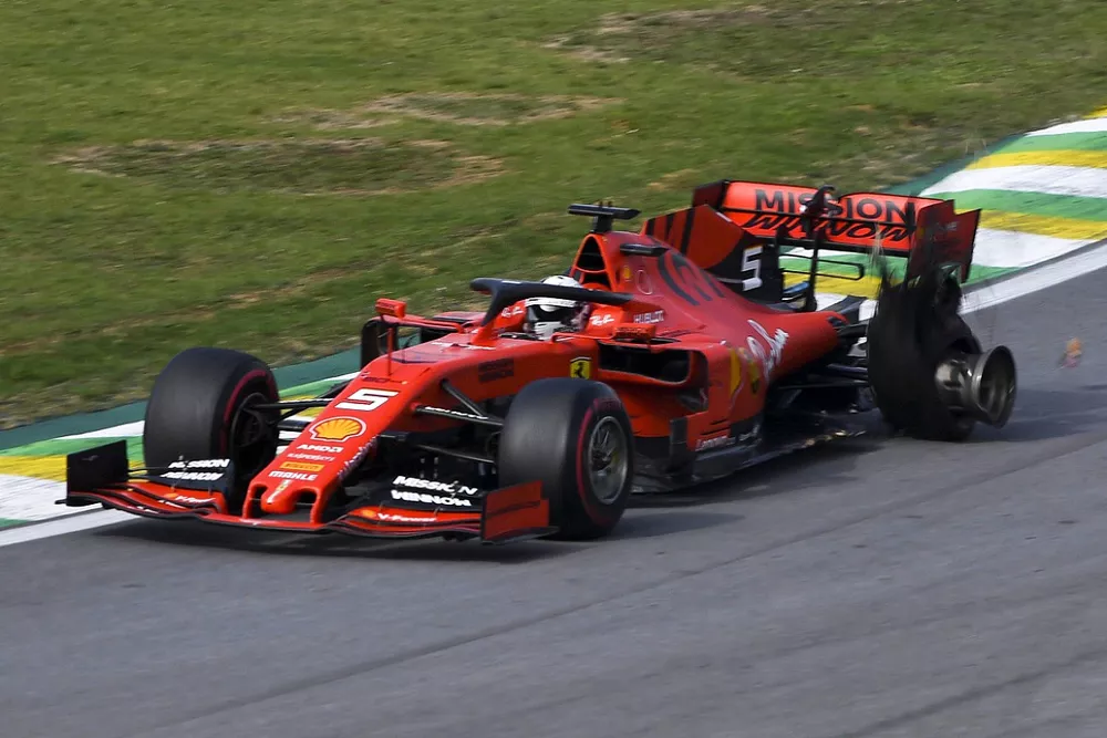 Sebastian Vettel, Ferrari with damage after crashing with Charles Leclerc, Ferrari SF90
