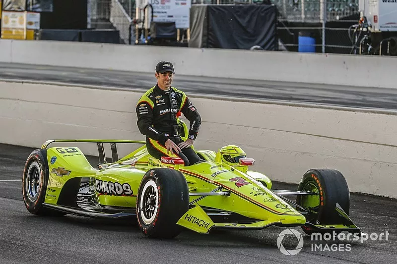 NTT P1 Award and pole winner Simon Pagenaud, Team Penske Chevrolet poses for the front row photos