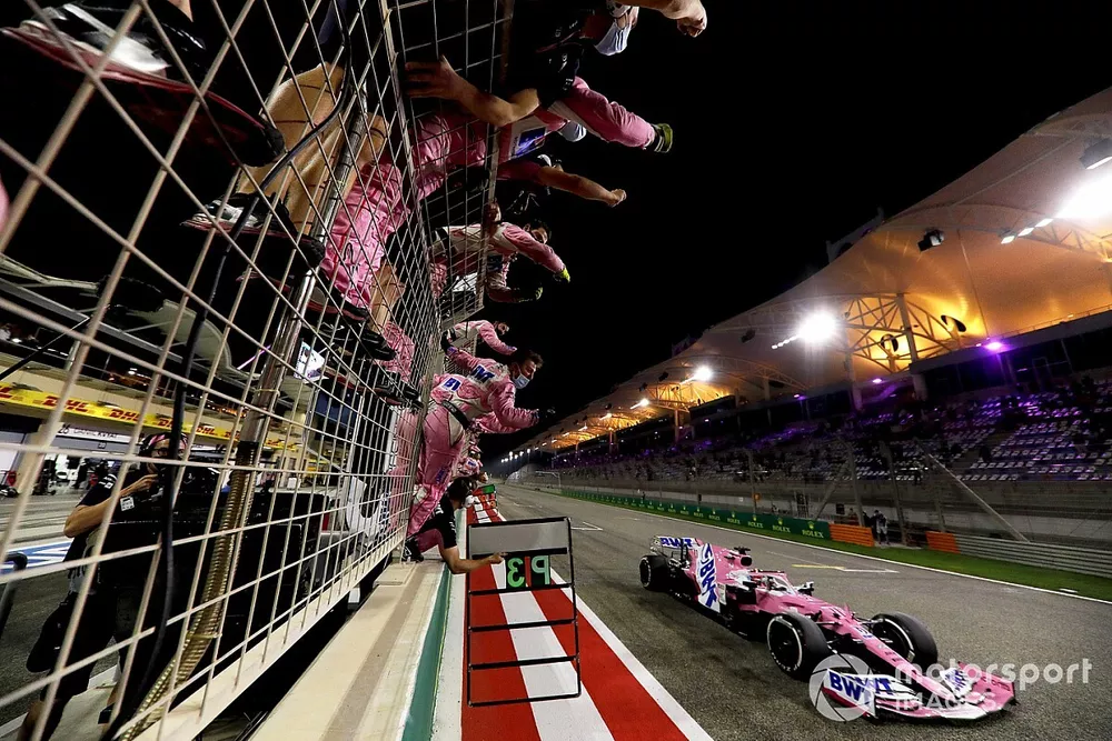 Sergio Perez, Racing Point RP20, 1st position, crosses the line for victory to the delight of his team