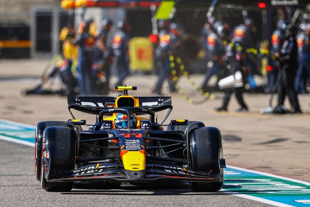 Sergio Perez, Red Bull Racing RB20 after making a pit stop