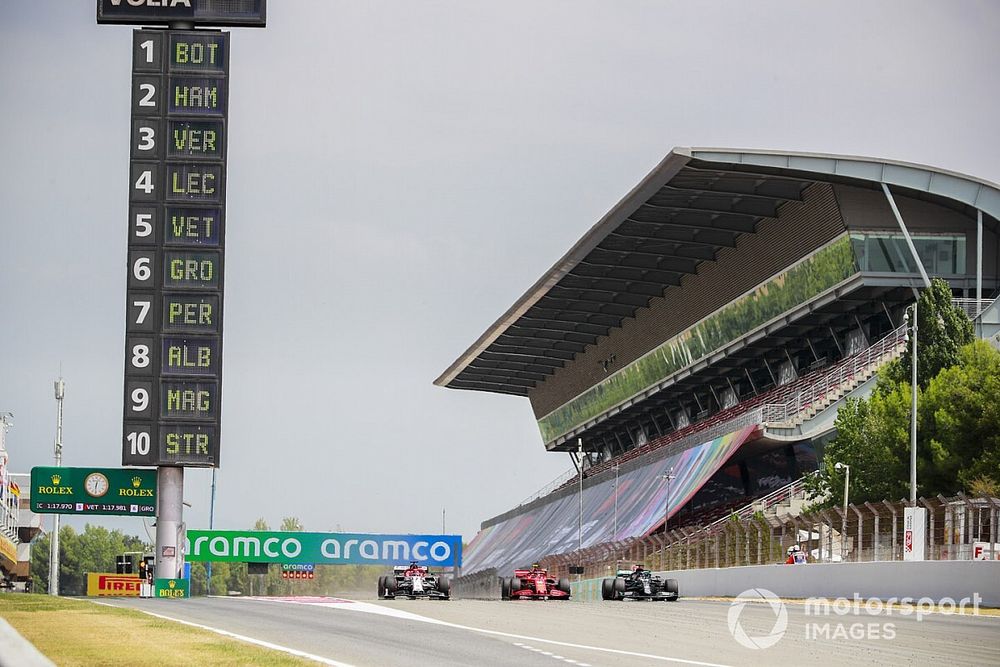 Lewis Hamilton, Mercedes F1 W11 EQ Performance, leads Charles Leclerc, Ferrari SF1000, and Kimi Raikkonen, Alfa Romeo Racing C39