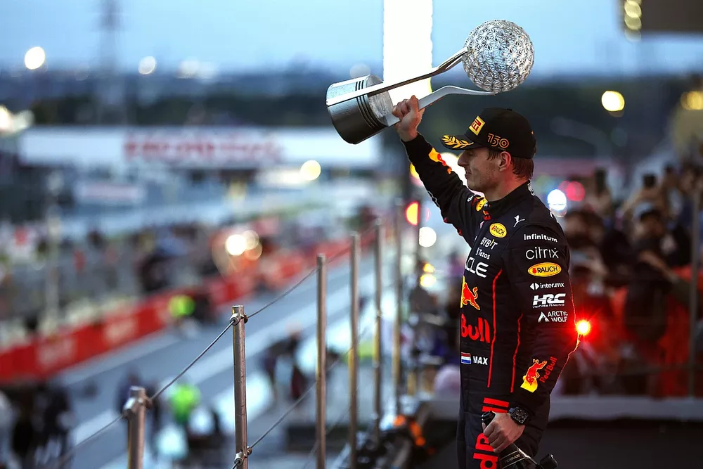 Max Verstappen, Red Bull Racing, 1st position, lifts his trophy