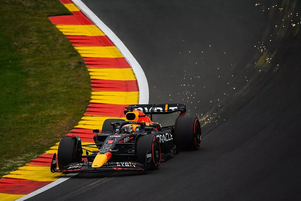 Sparks trail behind Max Verstappen, Red Bull Racing RB18