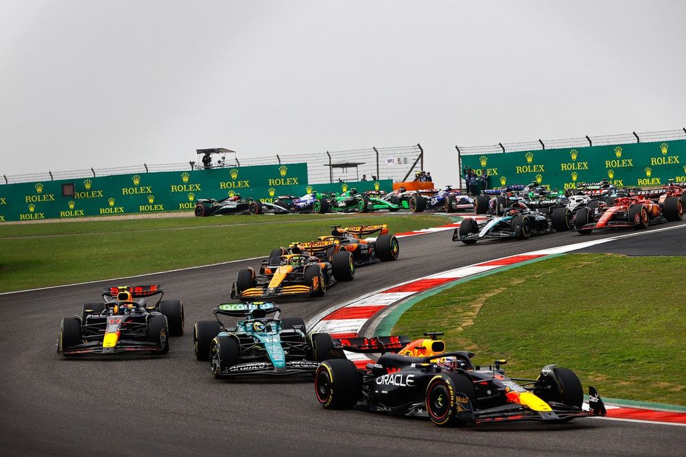Max Verstappen, Red Bull Racing RB20 leads Fernando Alonso, Aston Martin AMR24 and Sergio Perez, Red Bull Racing RB20