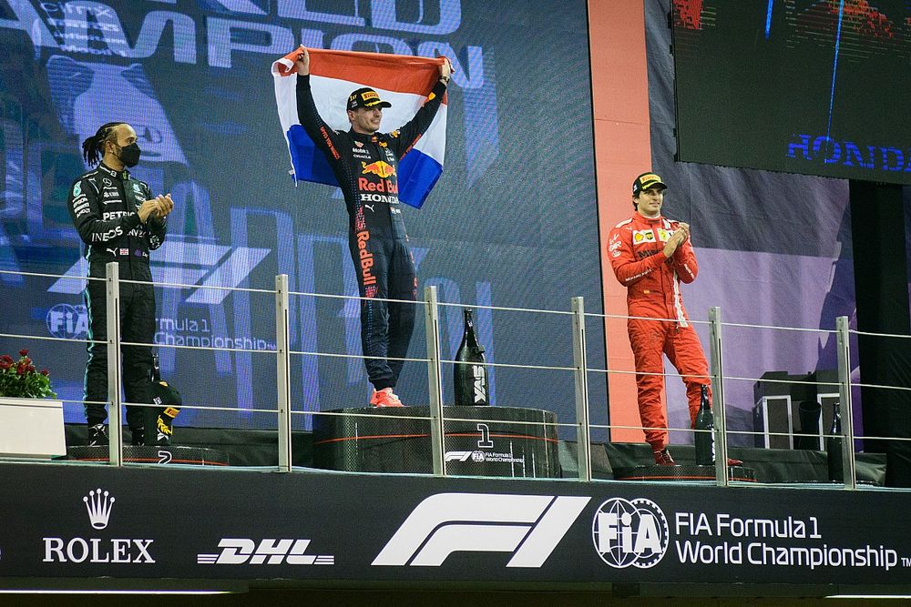 Podium: race winner and 2021 F1 World Drivers Champion Max Verstappen, Red Bull Racing, second place Lewis Hamilton, Mercedes, third place Carlos Sainz Jr., Ferrari