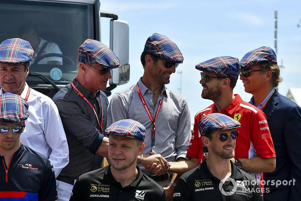 David Coulthard, Mark Webber, Sebastian Vettel, Ferrari, Daniil Kvyat, Toro Rosso, Kevin Magnussen, Haas F1, and Romain Grosjean, Haas F1, join the other drivers in wearing flat caps to celebrate the recent birthday of Sir Jackie Stewart, 3-time F1 Champion