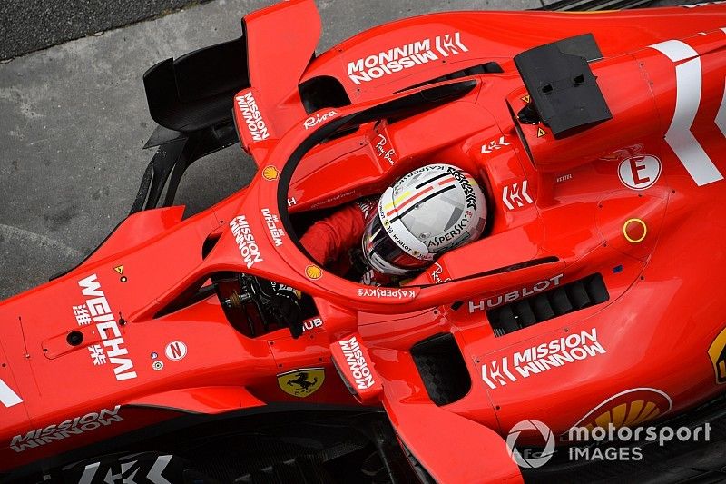 Sebastian Vettel, Ferrari SF71H waves his hands when on the weighbridge during Q2 
