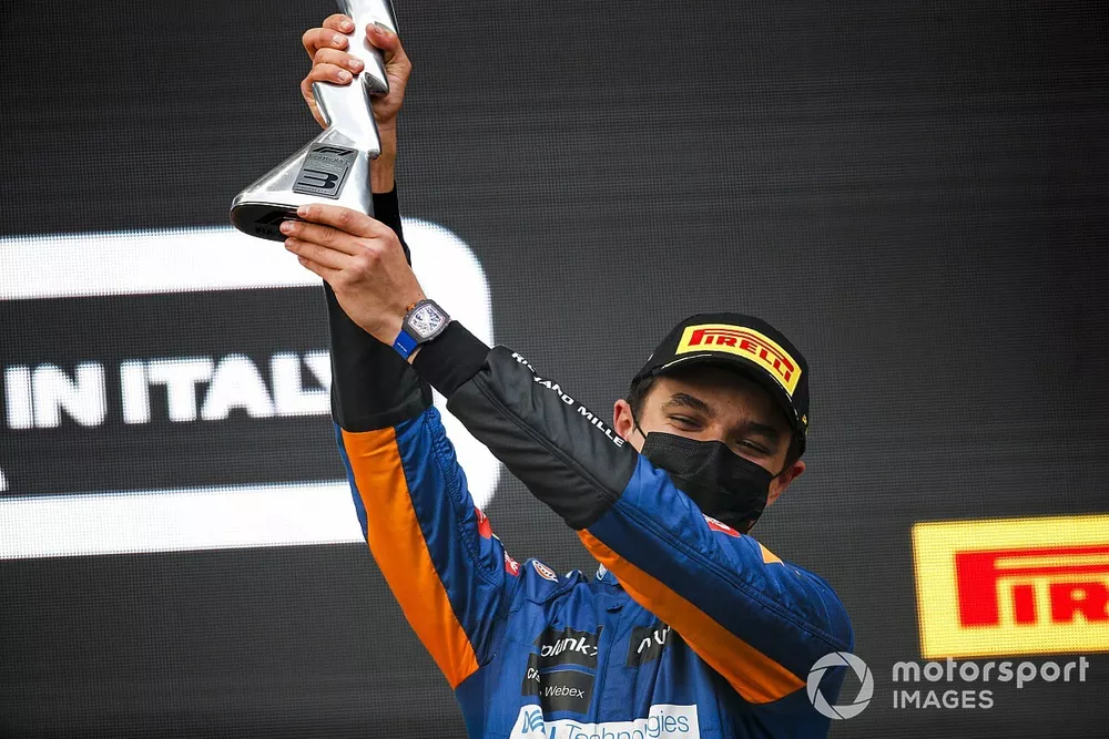 Lando Norris, McLaren, 3rd position, with his trophy