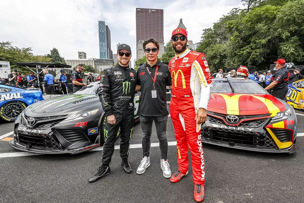 Kamui Kobayashi with Tyler Reddick, 23XI Racing, Monster Energy Toyota Camry and Bubba Wallace, 23XI Racing, McDonald's Toyota Camry
