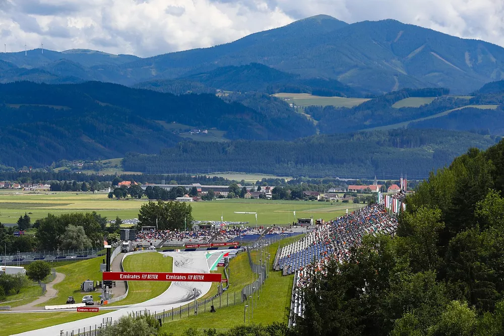 Fans in the grandstands anticipate the start
