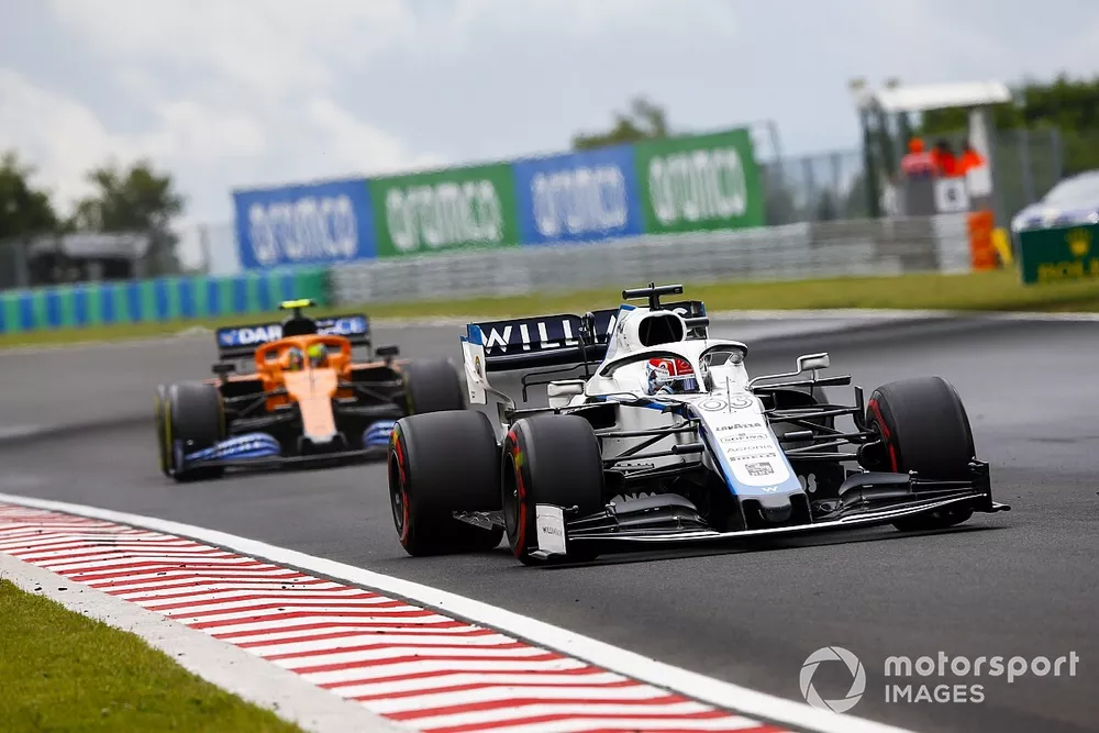 George Russell, Williams FW43, leads Lando Norris, McLaren MCL35