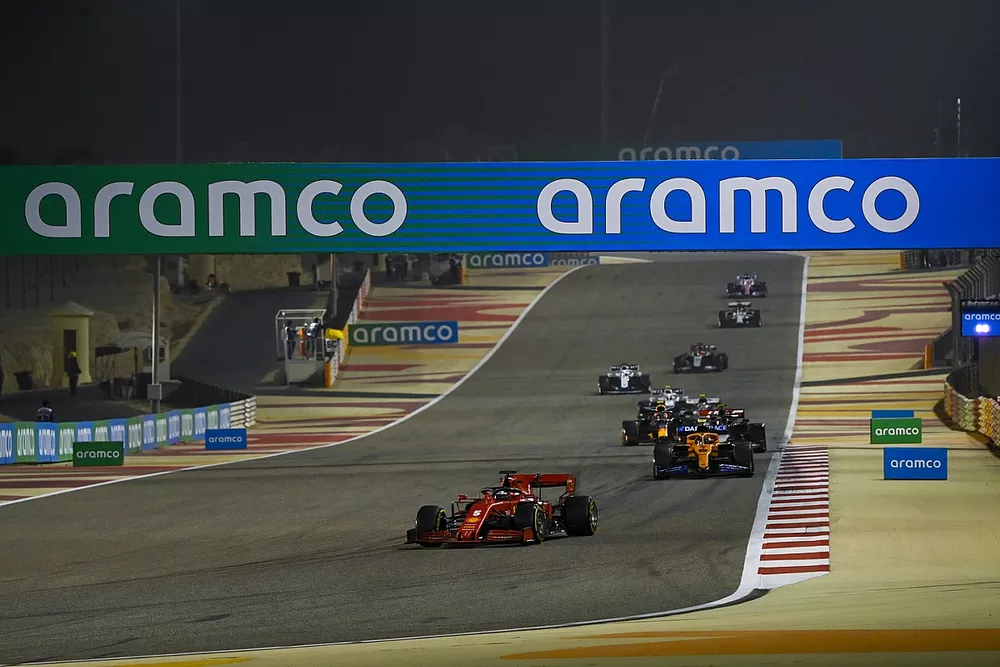 Sebastian Vettel, Ferrari SF1000, Lando Norris, McLaren MCL35 and Kevin Magnussen, Haas VF-20 