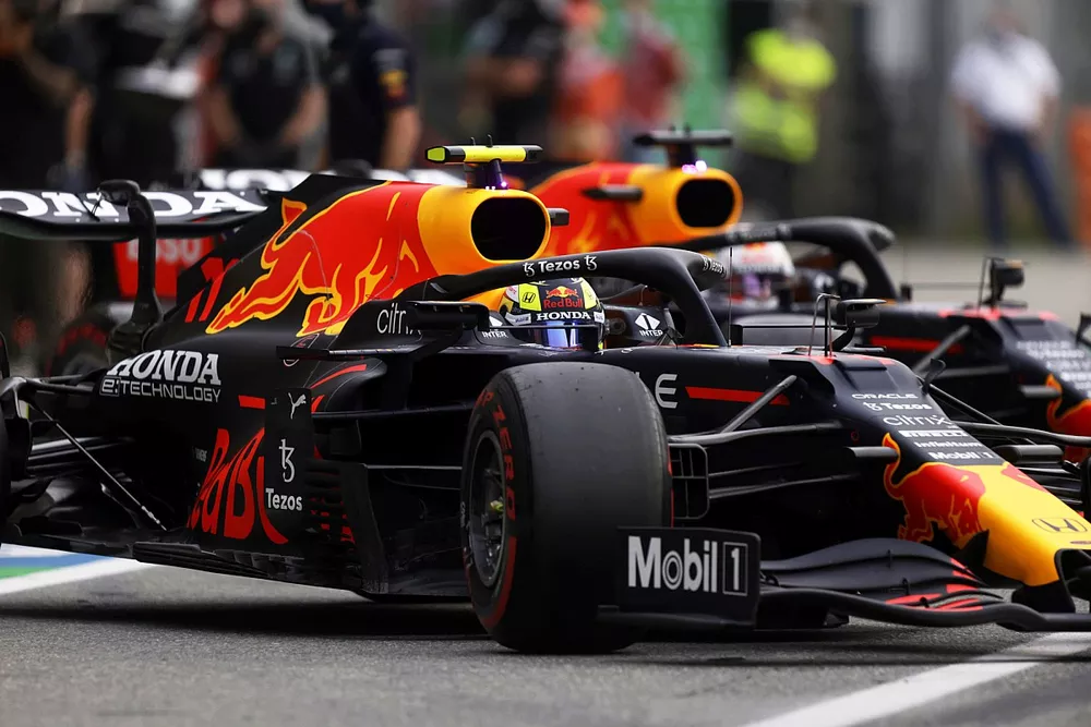Sergio Perez, Red Bull Racing RB16B, leaves the garage