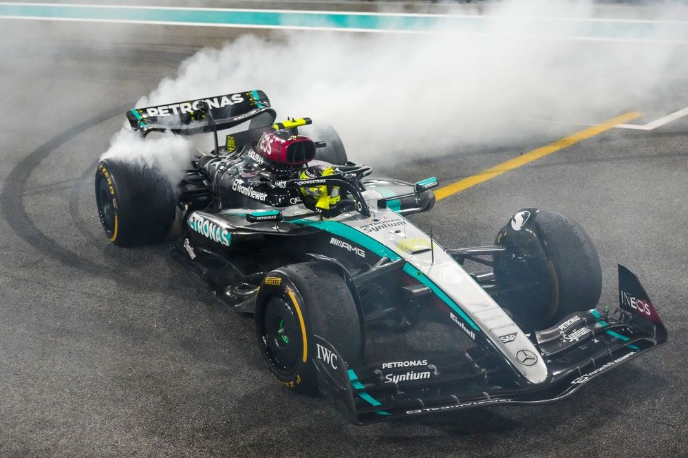 Lewis Hamilton, Mercedes F1 W15, performs donuts at the end of the race
