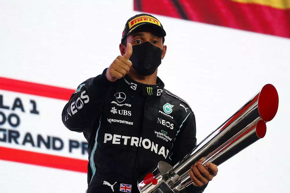 Lewis Hamilton, Mercedes, 1st position, with his trophy
