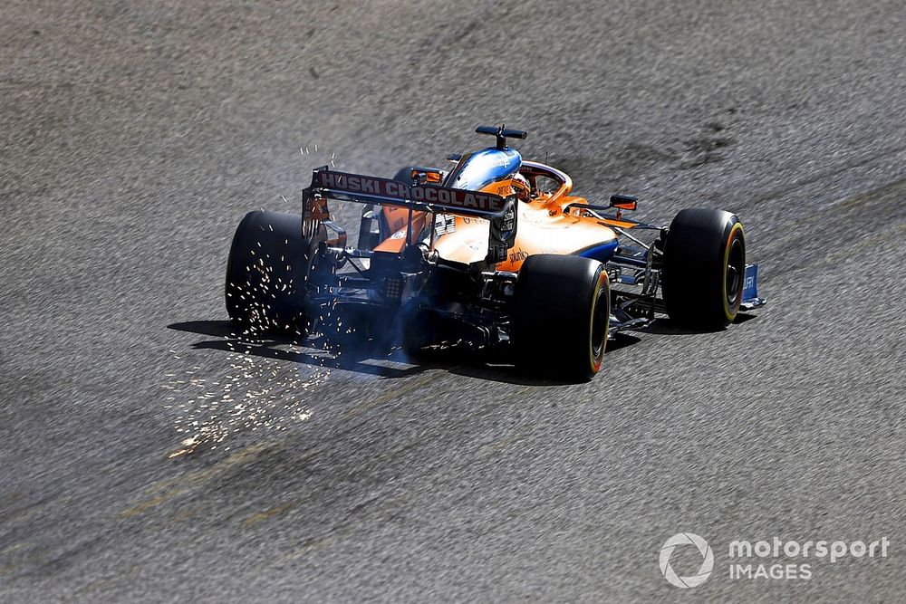 Sparks trail from Carlos Sainz Jr., McLaren MCL35