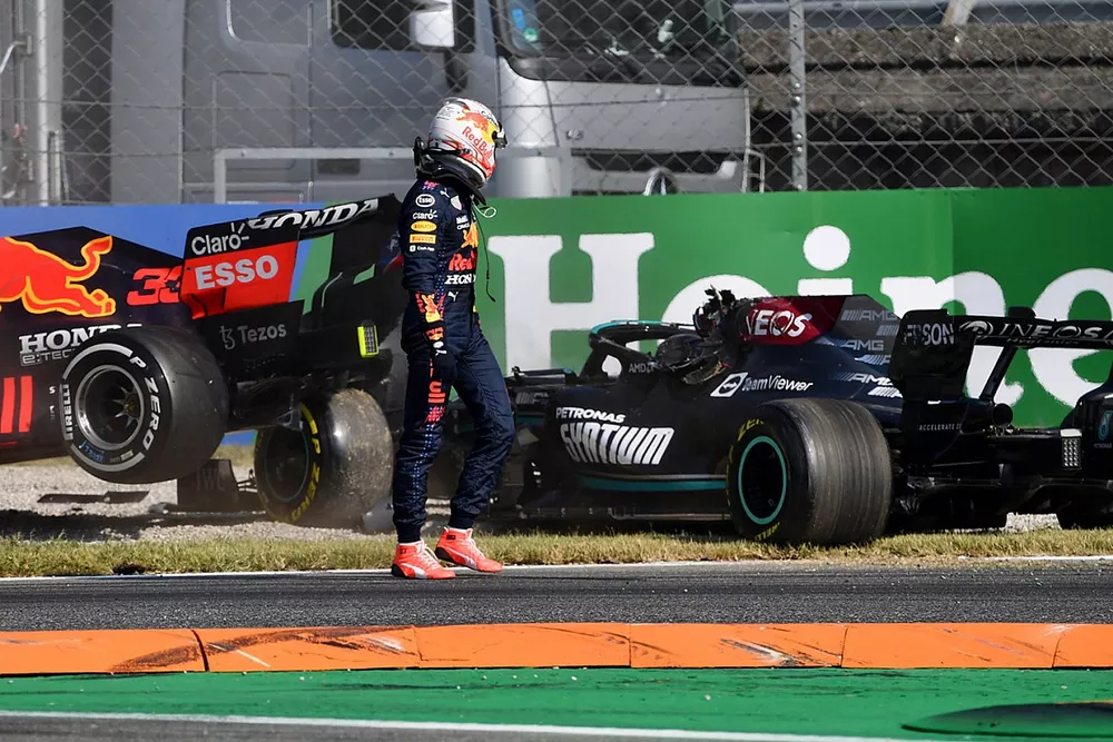 Max Verstappen, Red Bull Racing, looks on Lewis Hamilton, Mercedes W12 after colliding