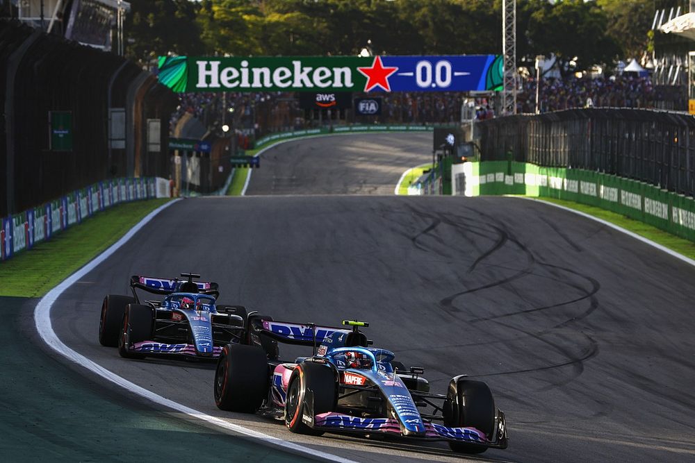 Esteban Ocon, Alpine A522, leads Fernando Alonso, Alpine A522