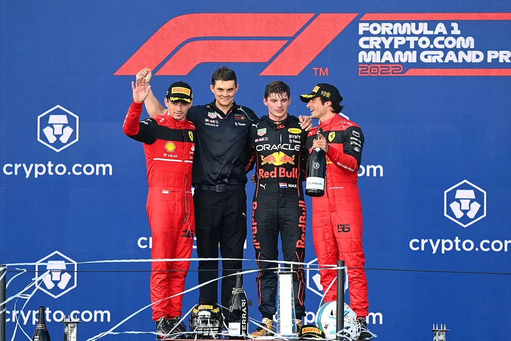 Charles Leclerc, Ferrari, 2nd position, the Red Bull trophy delegate, Max Verstappen, Red Bull Racing, 1st position, Carlos Sainz, Ferrari, 3rd position, on the podium