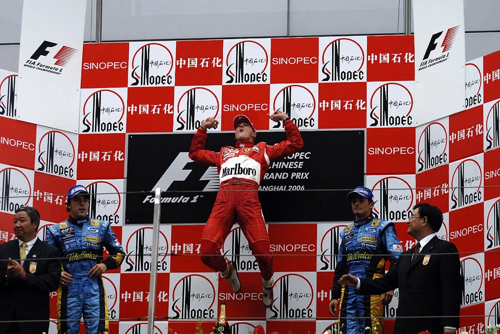 Podium: race winner Michael Schumacher with Fernando Alonso and Giancarlo Fisichella