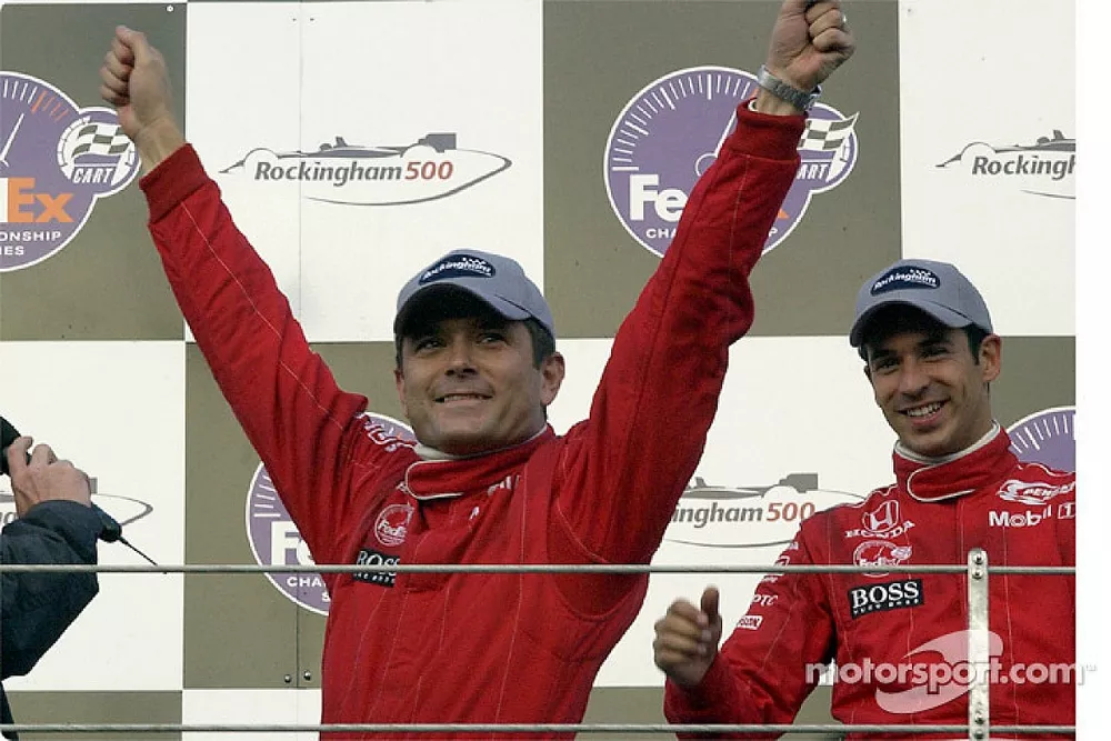 The podium: Gil de Ferran and Helio Castroneves