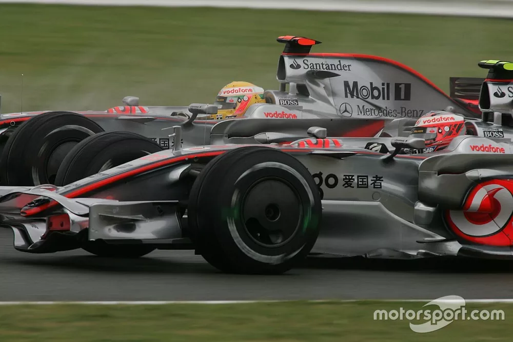Lewis Hamilton, McLaren Mercedes overtakes Heikki Kovalainen, McLaren Mercedes