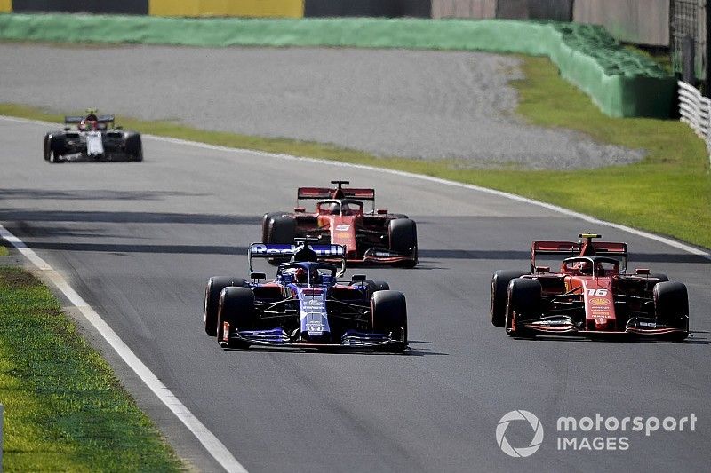 Daniil Kvyat, Toro Rosso STR14, leads Charles Leclerc, Ferrari SF90, Sebastian Vettel, Ferrari SF90, and Antonio Giovinazzi, Alfa Romeo Racing C38