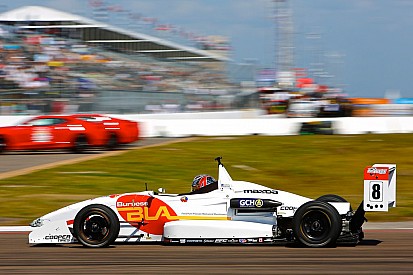 Martin edges tight battle for pole at IMS