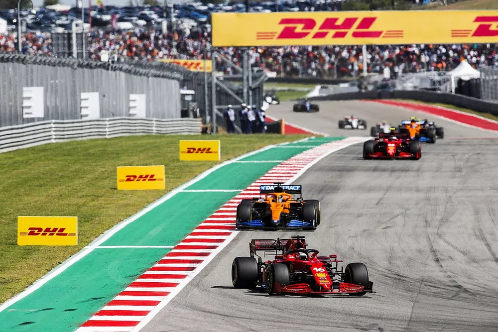 Charles Leclerc, Ferrari SF21, Daniel Ricciardo, McLaren MCL35M, and Carlos Sainz Jr., Ferrari SF21