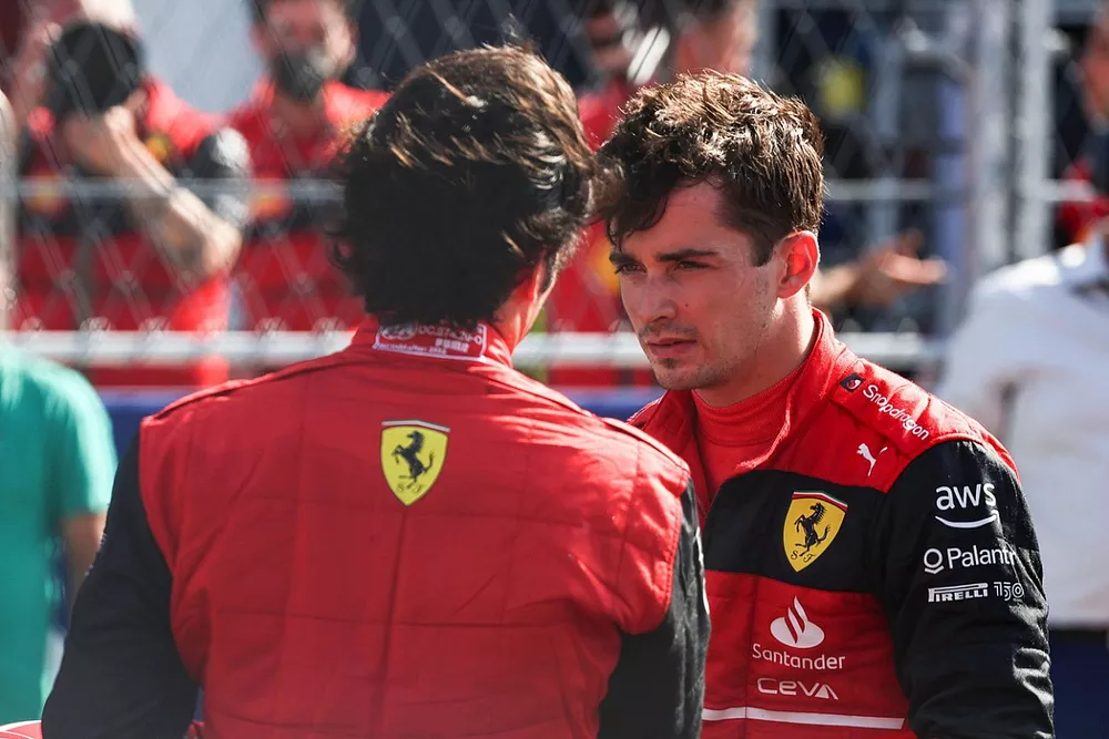 Front row starters Carlos Sainz, Ferrari, pole man Charles Leclerc, Ferrari, talk after Qualifying