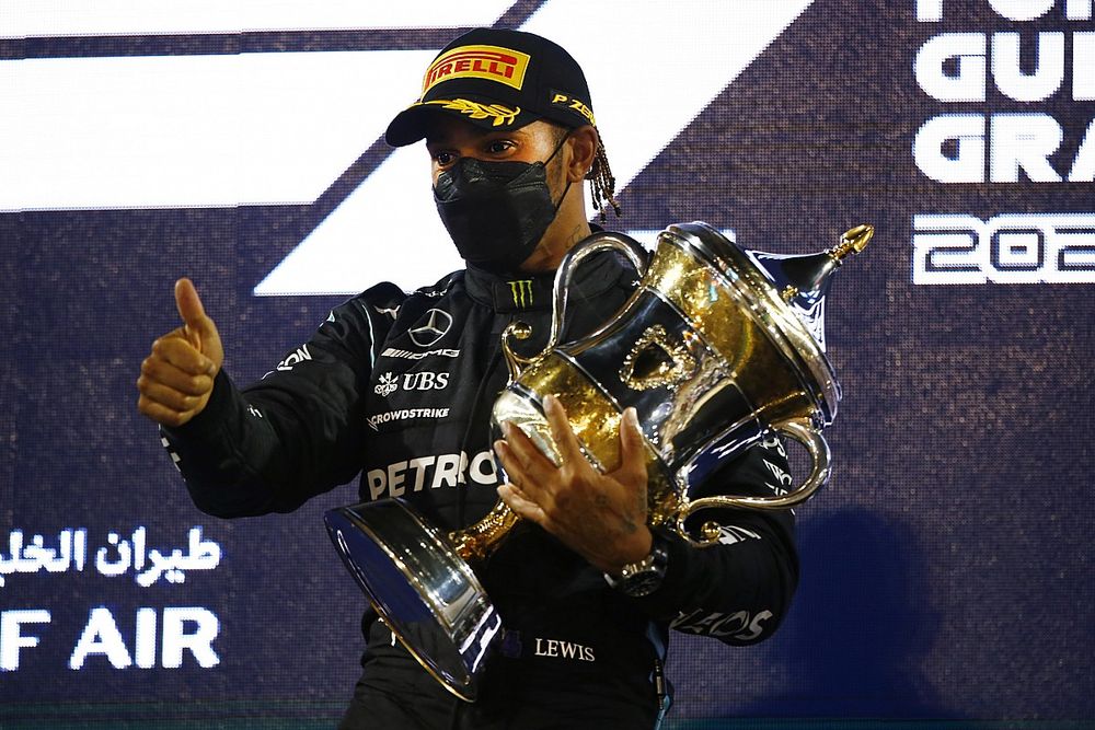 Lewis Hamilton, Mercedes, 1st position, with his trophy