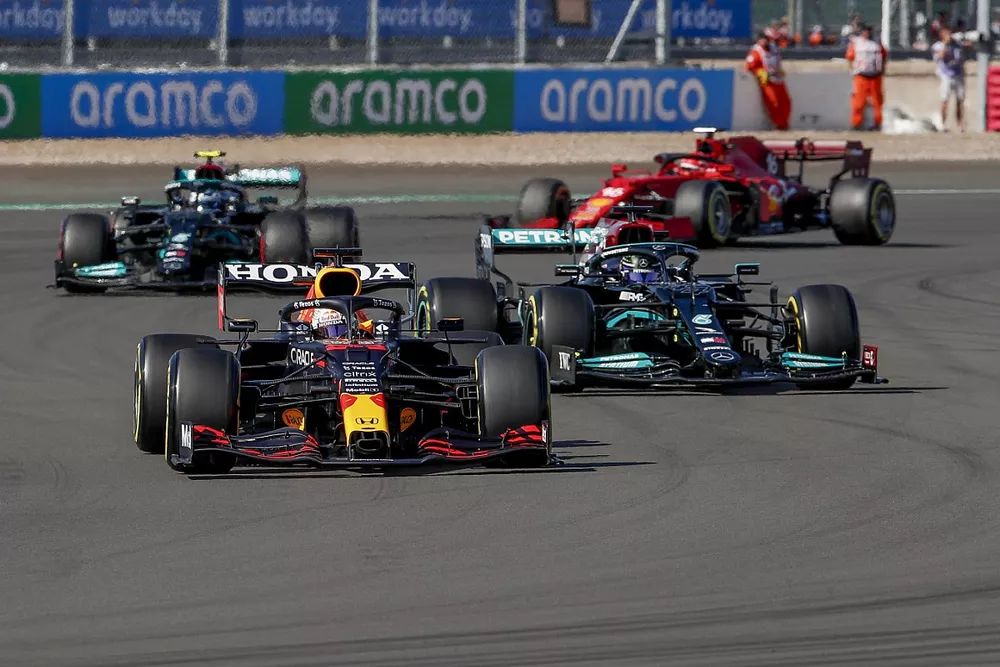 Max Verstappen, Red Bull Racing RB16B, Lewis Hamilton, Mercedes W12, Valtteri Bottas, Mercedes W12, and Charles Leclerc, Ferrari SF21