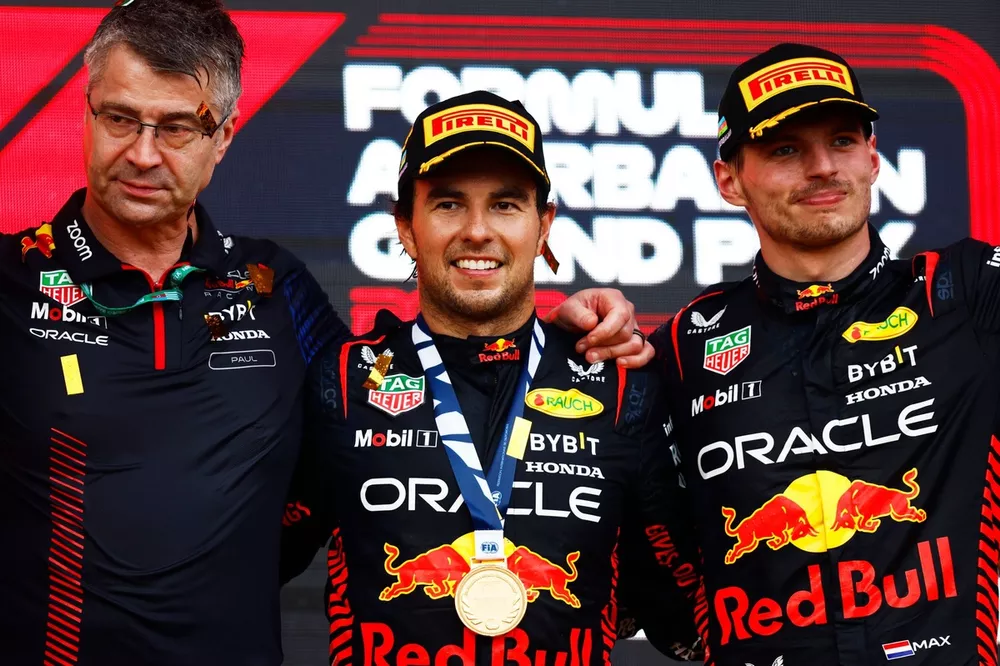 The Red Bull trophy delegate, Sergio Perez, Red Bull Racing, 1st position, Max Verstappen, Red Bull Racing, 2nd position, on the podium